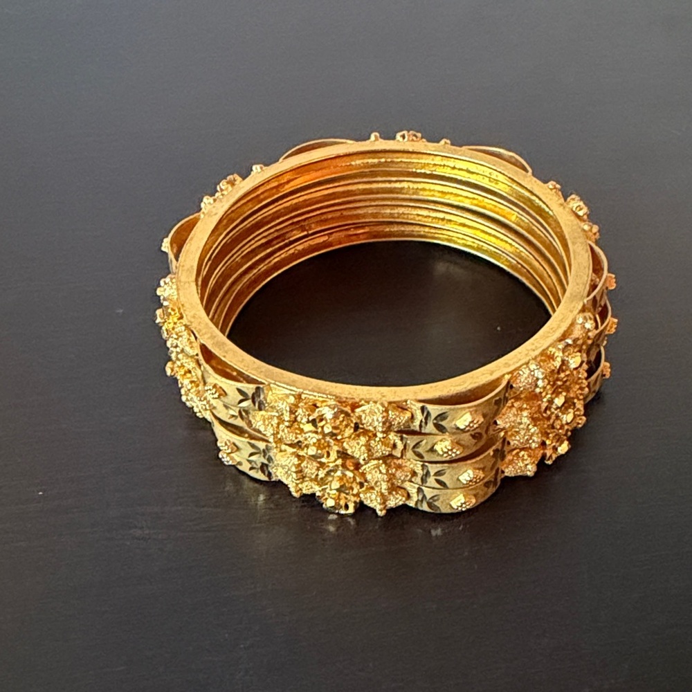 Set of 4 Gold Tone Bangles